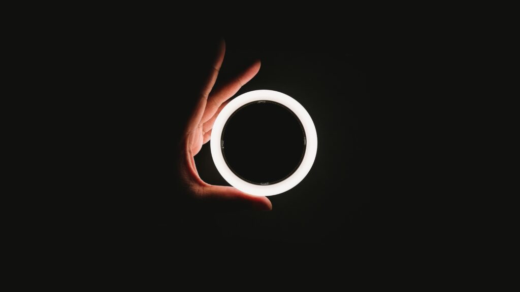 hand holding circle of light