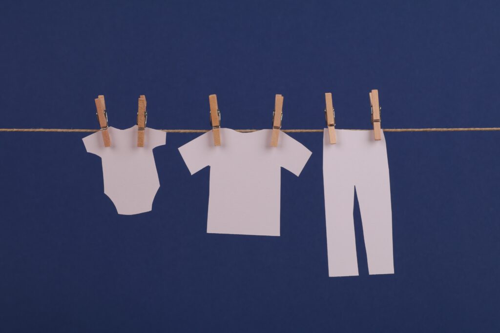 paper clothes on a clothesline
