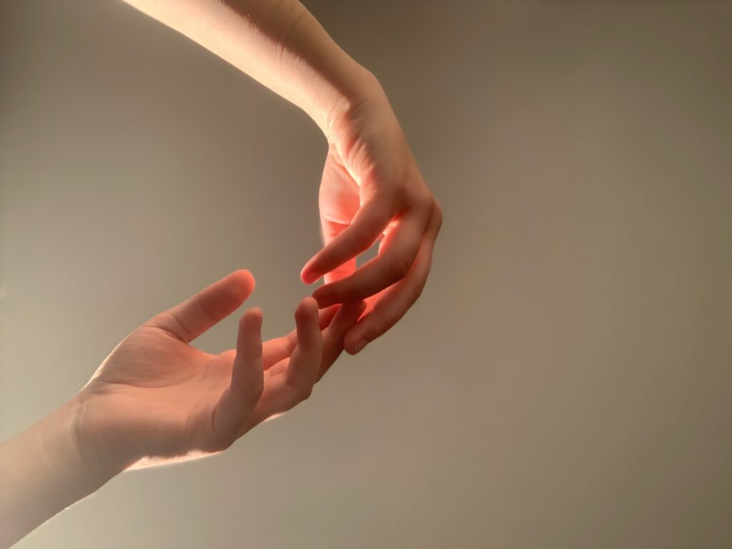 two hands touching