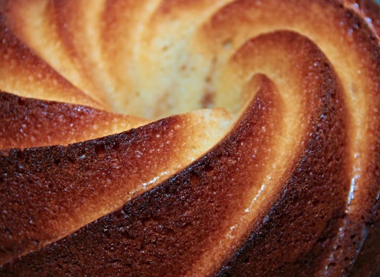 close up of a round golden crispy cake