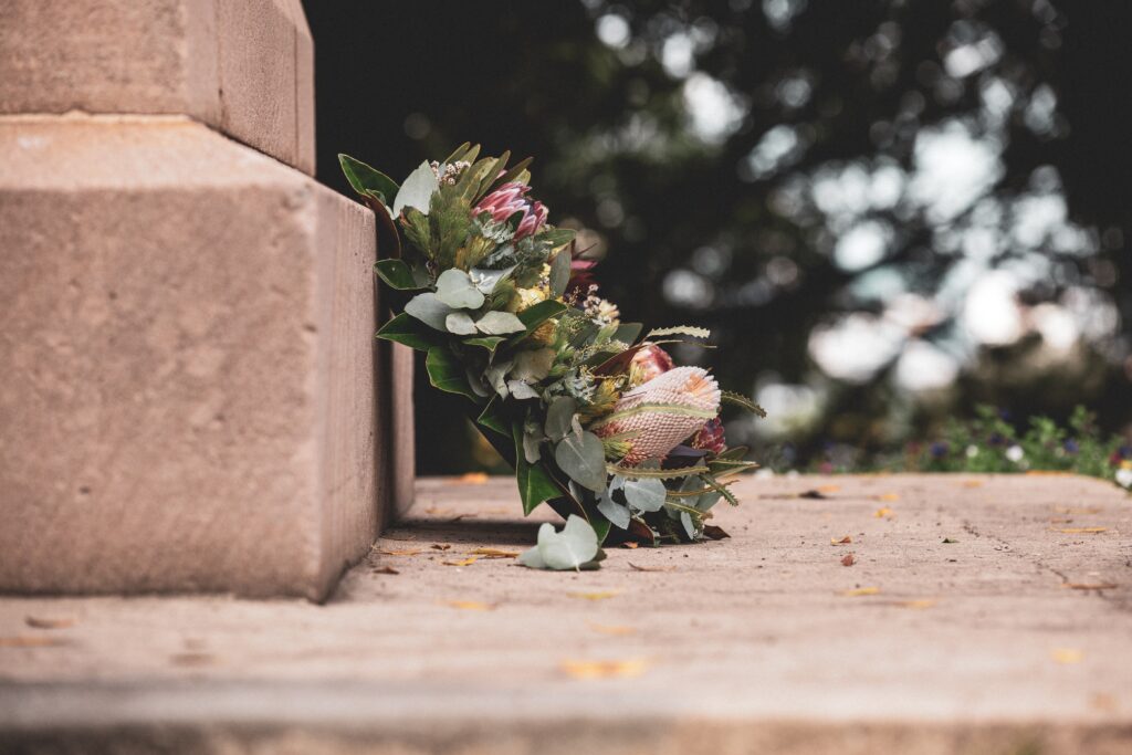 grave with a wreath of flowers