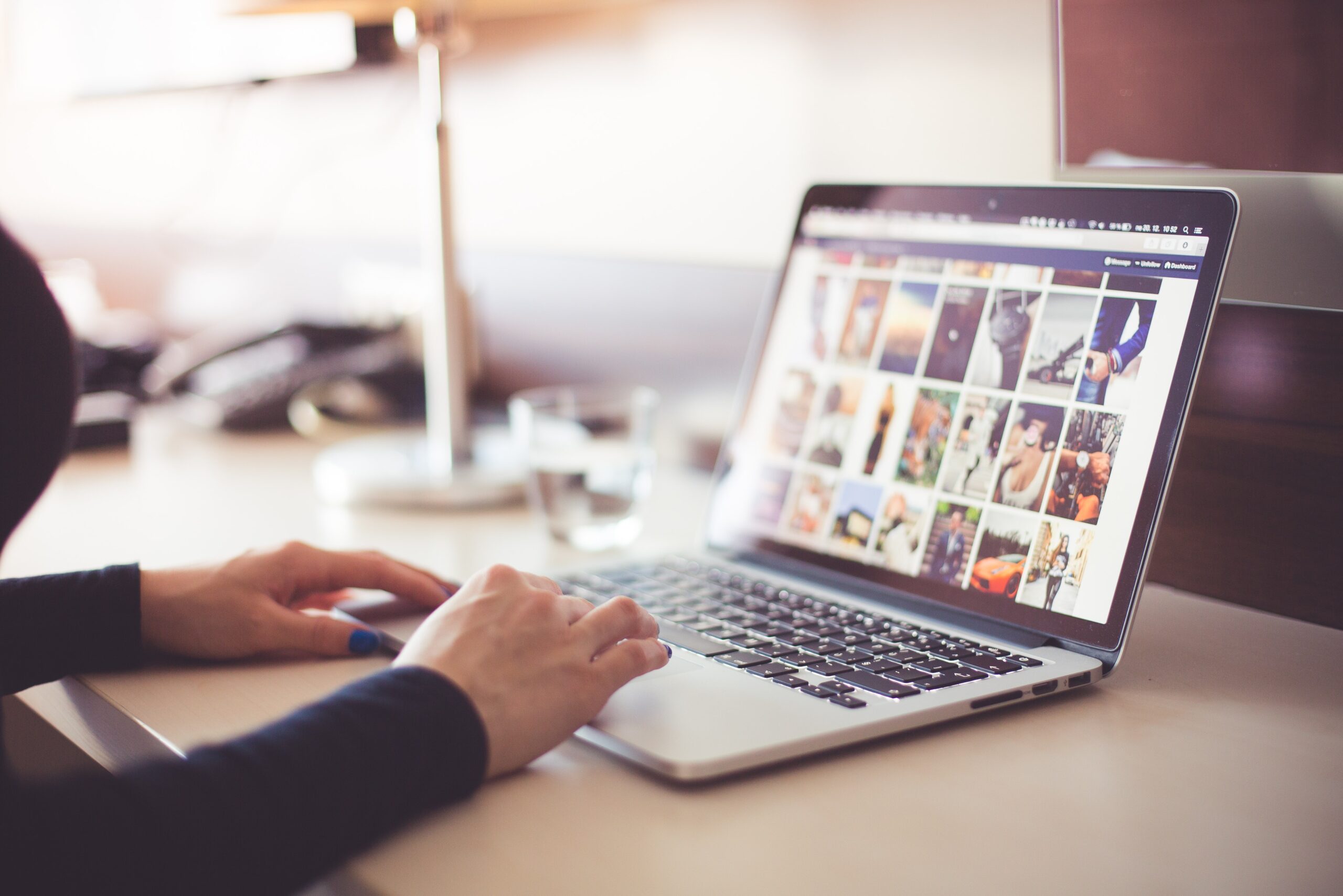 woman making online photo album