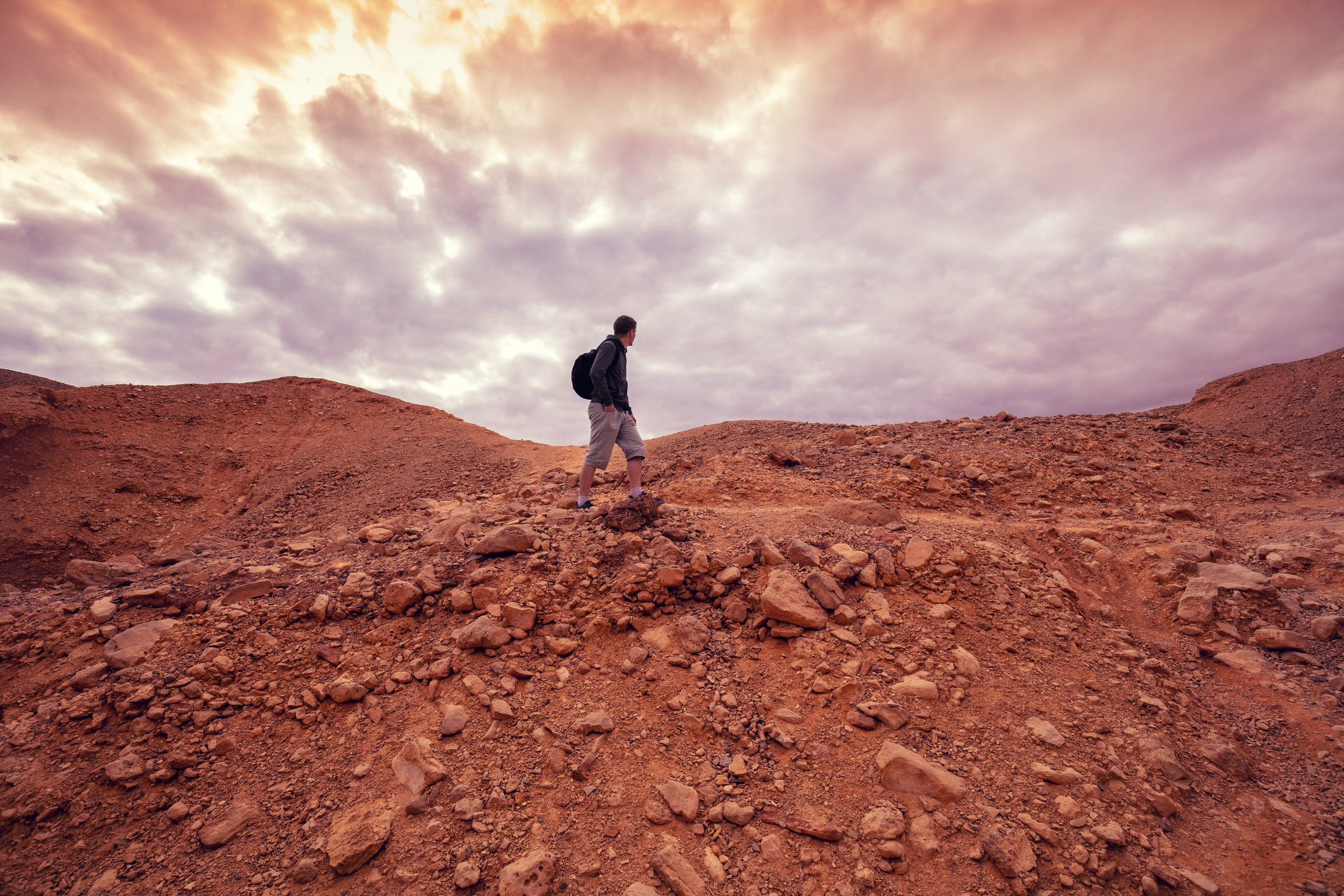 person hiking in the desert