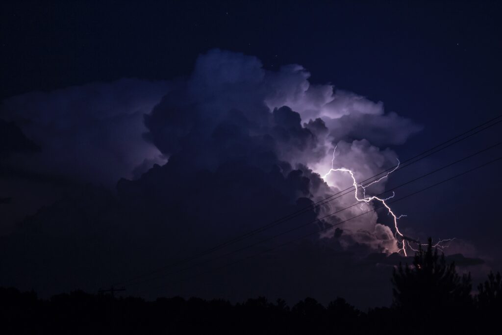 a thunderstorm in a dark sky