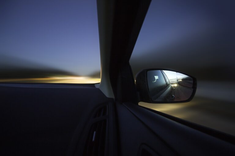 a car driving at dusk