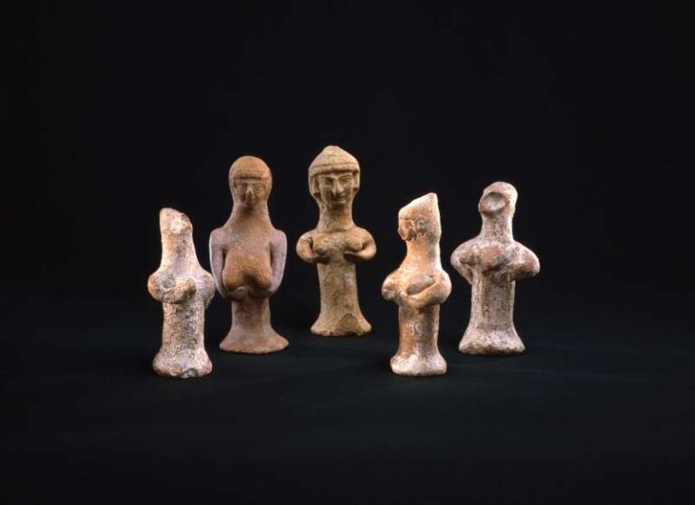an assortment of Astarte figurines representing the goddess Asherah