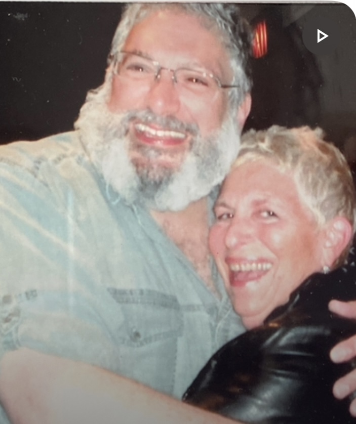 Actor Harvey Fierstein hugs Lynn,