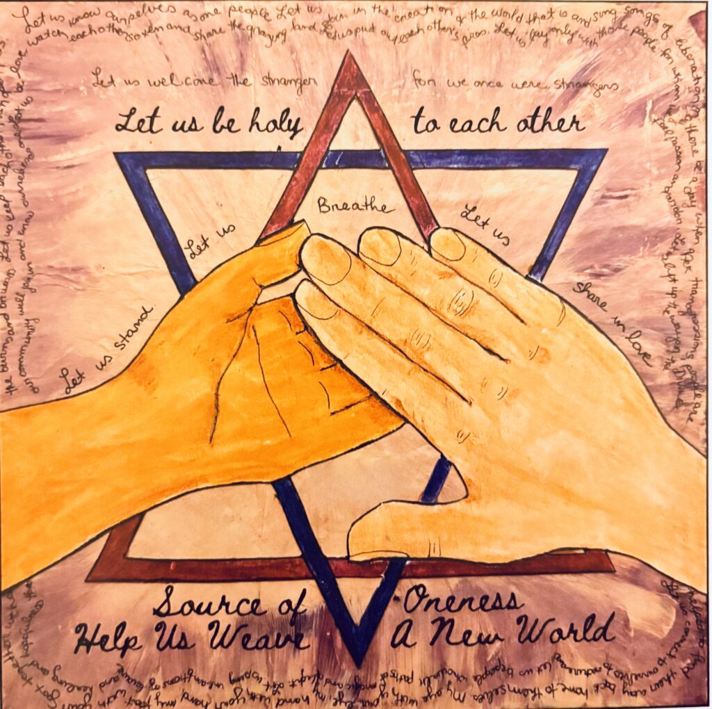 Two hands touch over a Star of David with text about unity, love, and peace surrounding them.