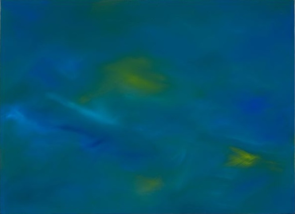 Blurry abstract image with blue and green hues blending softly across the frame.