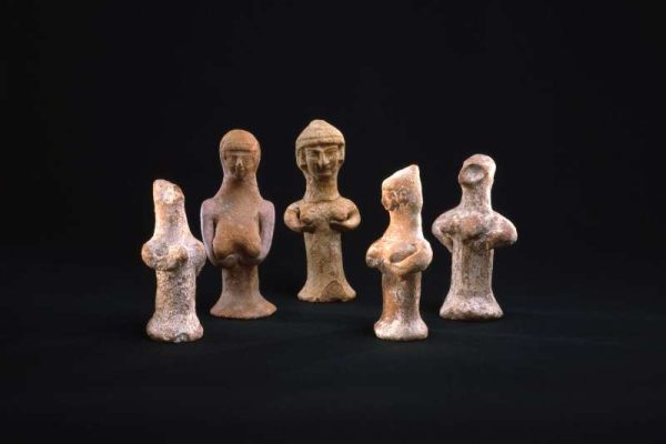 an assortment of Astarte figurines representing the goddess Asherah
