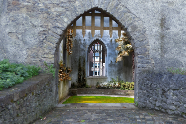 a stone path leading to an archway