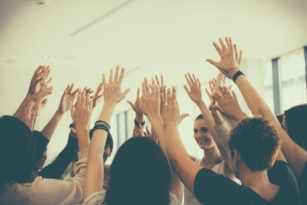 Group_hands-up_istock