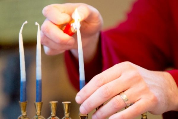 Lighting-Hanukkah-Candles-_istock_featured