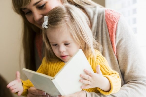 Mother-Reading-to-Daughter-_istock