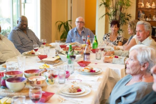 people sitting at a Passover table