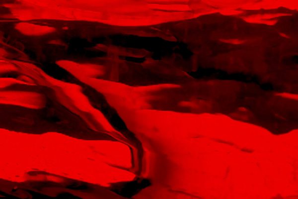 Abstract red and black marbled texture with fluid patterns and swirling lines.