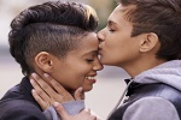 a lesbian couple kisses