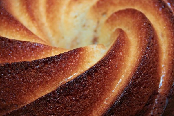 close up of a round golden crispy cake