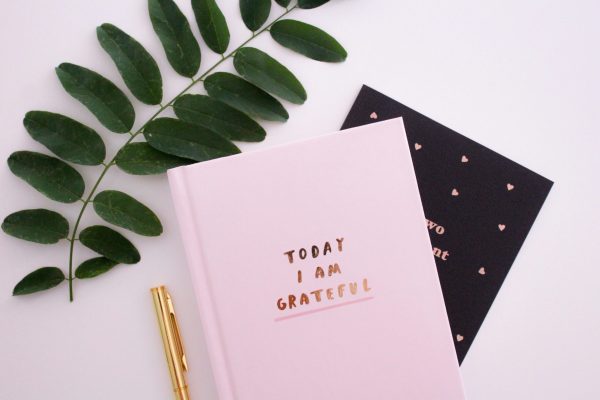 a gratitude journal and pen