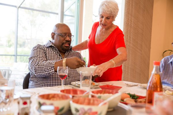 two people sit at the Seder table