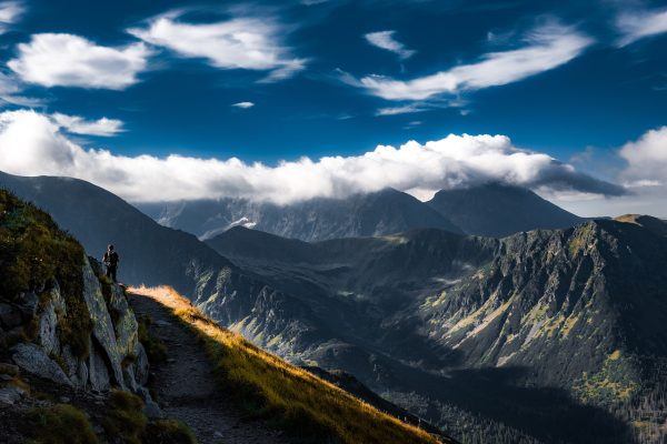 a mountain range with the blue sky above