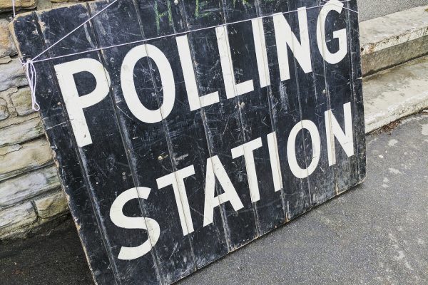 a sign that says polling station