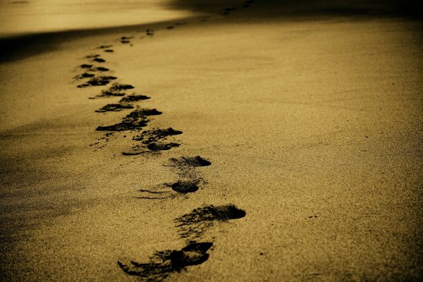 footsteps in sand