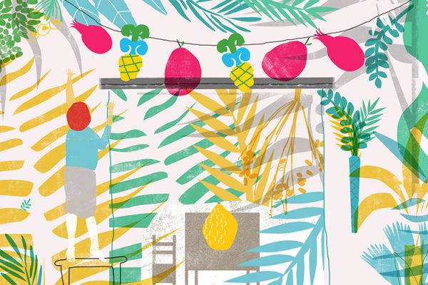 Colorful tropical-themed room with hanging fruit decorations and large leaf patterns.