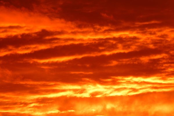 a fiery sunset of orange and yellow