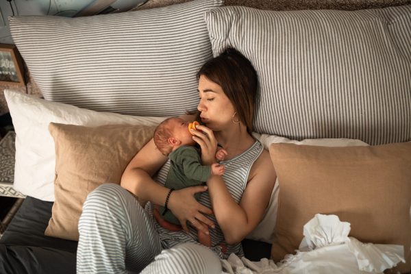 woman holding newborn baby