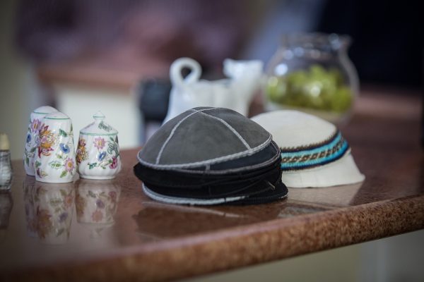 a table with kippot